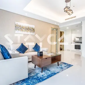 Staycae Homes - Paramount Midtown شقة